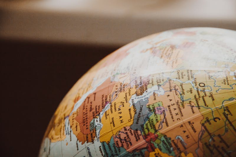 Close-up of a globe showing continents and country borders